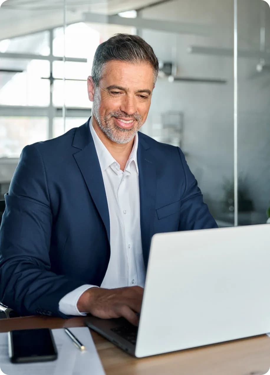 An editor at work on a laptop
