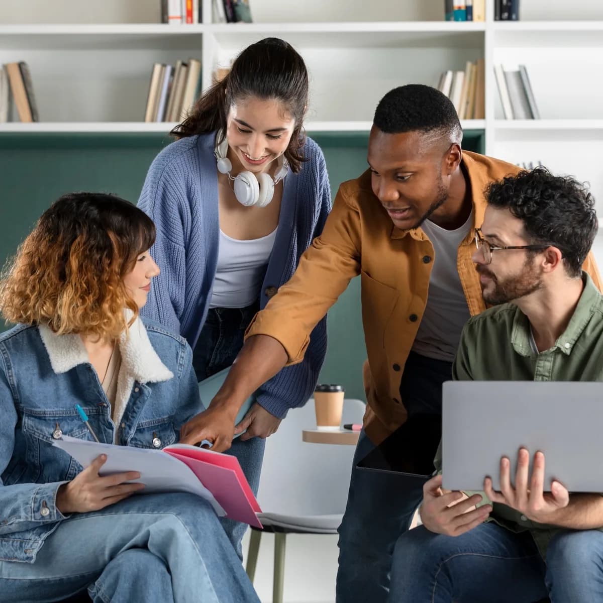 A group of students discussing their work